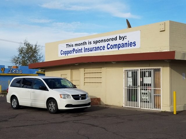 Corporate sponsor banner on pantry building